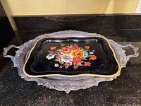 Both trays stacked to show comparative size and design