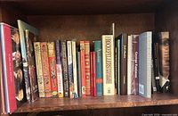 Full shelf view showing entire group of books