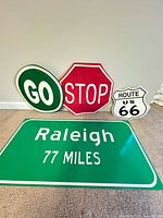 Front view of all four signs