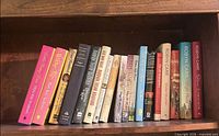 Full shelf view showing all ten book spines