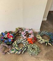 All eight wreaths grouped on floor