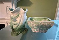 Vase and planter front view showing designs and colors