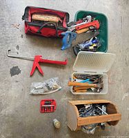 overview of lot with tool bag, totes, caulking gun, bit set, wooden fastener box