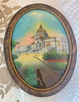 Oval frame Capitol print showing architectural subject