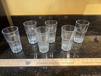 Six tumblers lined up beside 18-inch ruler showing size and quantity