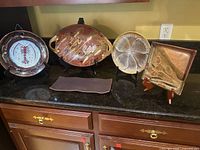 Group shot of all five stoneware pieces on countertop