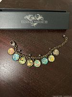 Bracelet displayed with branded box lid
