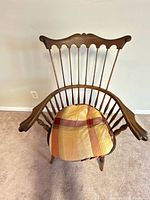Front view of Windsor spindle-back armchair with cushion