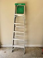 Full view of folded 6-ft Werner aluminum step ladder