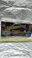 Front view of boxed Harley-Davidson F-150 die-cast model showing truck and branding