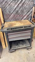 Overall view of Craftsman rolling tool cart front and casters