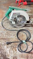 Full view of Craftsman circular saw with power cord coiled
