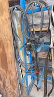 Cables hanging, showing overall length and clamps