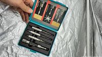 Open Makita carry case showing all four pieces in molded slots
