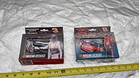 Front of both NASCAR 2000 playing card boxes