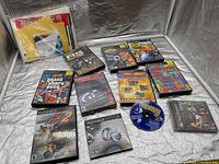 Overview of all game cases, loose disc and sealed adaptor kit
