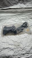 Controller sealed in plastic bag showing full outline