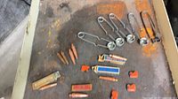Overview of copper tips, steel spring retainers, Shurlite tins and boxes
