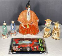Group shot showing all five porcelain figures and lacquer tray