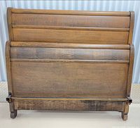 Front view of both headboard and footboard showing overall design and finish