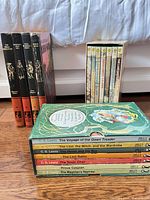 Group view: four Bancroft Classics hardcovers, Chronicles of Narnia slipcased set