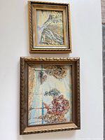 Both framed artworks hung together
