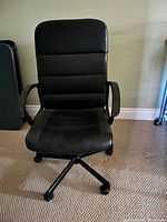 Front view of office chair showing overall design and condition