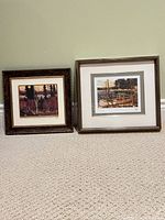 Front view of both framed prints side by side