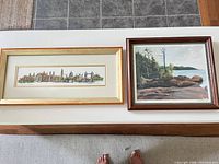 Both framed prints side by side for scale and comparison