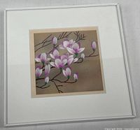 Full view of framed silk magnolia embroidery