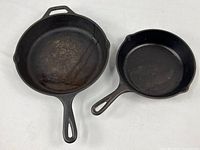Top view of both skillets showing size difference and handles