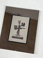 Front view of float frame showing abstract sculpture print