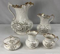 Full set showing five physical objects (six pieces including jar lid) with matching pattern