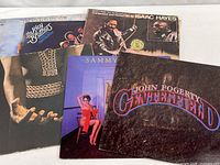 Group shot of all five album covers