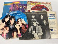 All six record jackets laid out showing front artwork