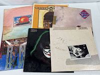 Stack view of six album covers