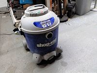 Front view showing overall vacuum, branding and capacity label