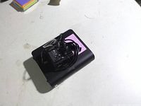 Top view of hard drive with power adapter and cable