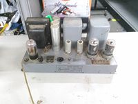 Full view of Brociner amplifier showing chassis, transformers, tubes, and power cord
