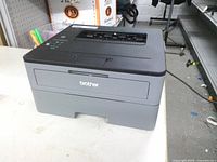 Front angled view showing Brother HL-L2350DW printer exterior