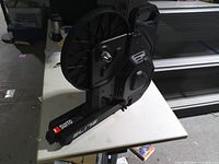 Overall view of Elite Suito-T trainer folded on tabletop