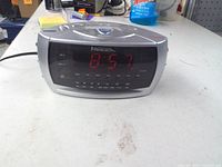 Front view showing red LED display and tuner scale