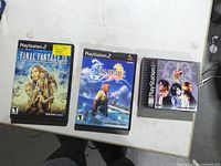 Front view of all three Final Fantasy game cases