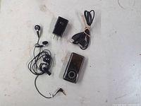 FM radio, headphones, charger, cable overview