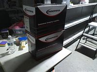 Two stacked Innovera boxes on table