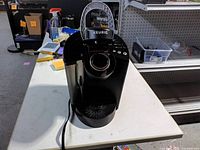 Front view showing full unit and power cord