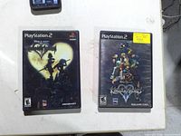 Front covers of both PS2 Kingdom Hearts titles