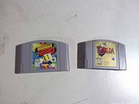 Front view of both Nintendo 64 cartridges showing label art