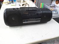 Front view showing Panasonic RX-FS410, speakers, control panel