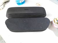 Two Roku speakers front and top view